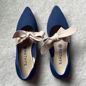 Navy and beige Mary Jane Rothy’s.  Size 10.5.